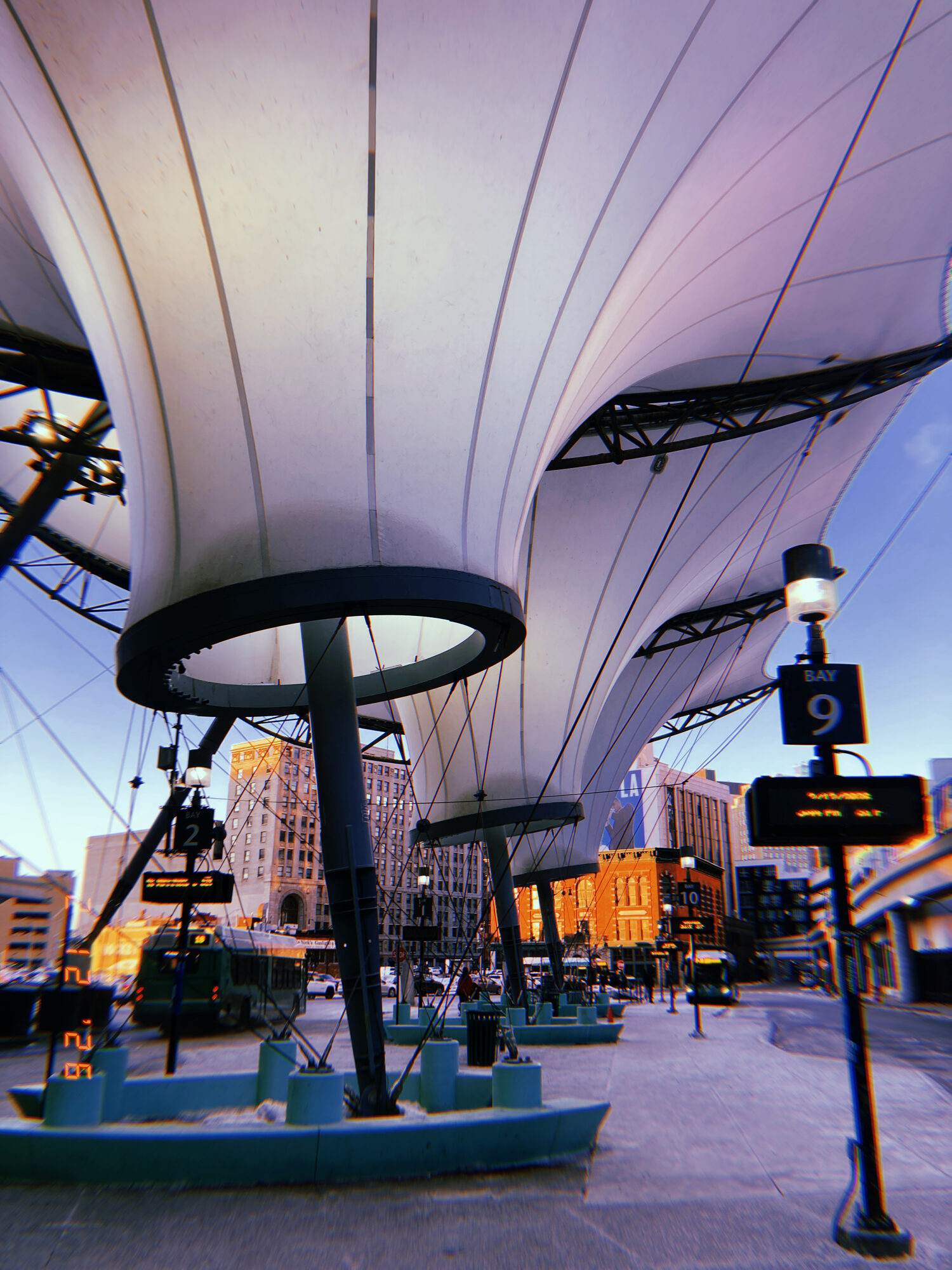 Wide view of the Rosa Parks Transit Center canopy at golden hour