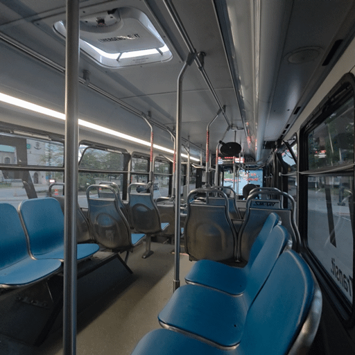 Empty DDOT bus interior looking down the center aisle